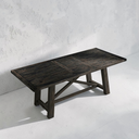 Dark wooden table against a light gray wall